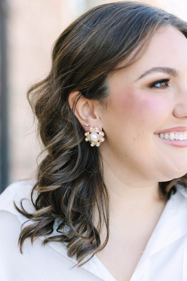 Plus Size gold floral stud earrings featuring a large central pearl and smaller pearl accents.