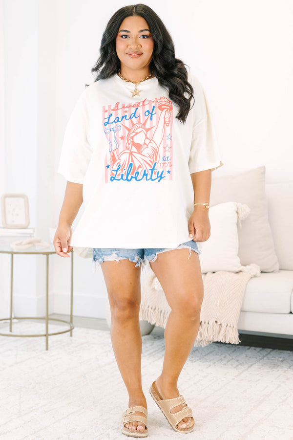 Plus Size ivory oversized boyfriend tee with a red and blue Statue of Liberty graphic.