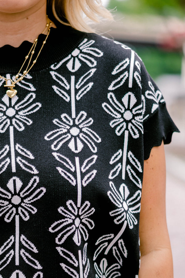 Chic Soul plus size clothing, black short scallop sleeve sweater with white outlined novelty floral print
