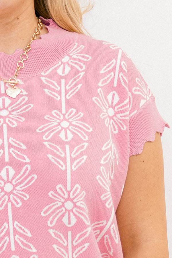 Chic Soul plus size clothing, pink short sleeve sweater with white floral print and ruffle detailing around the hem and end of the sleeves