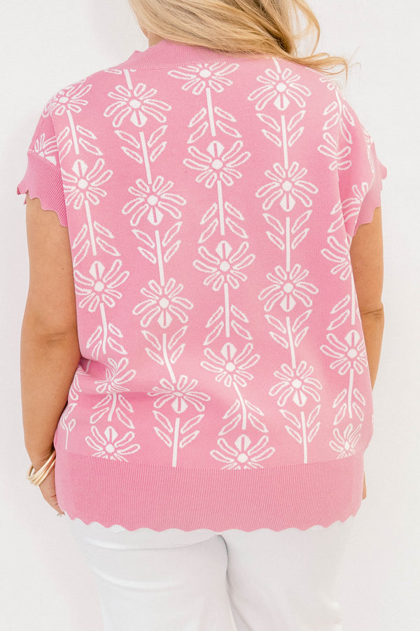 Chic Soul plus size clothing, pink short sleeve sweater with white floral print and ruffle detailing around the hem and end of the sleeves