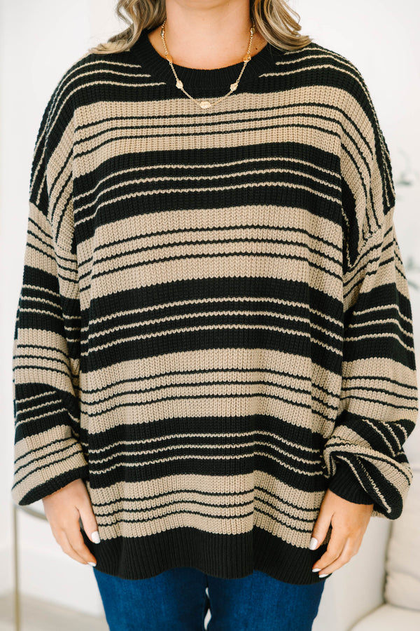 Plus Size oversized black and tan striped knit sweater with a crew neck and wide long sleeves.