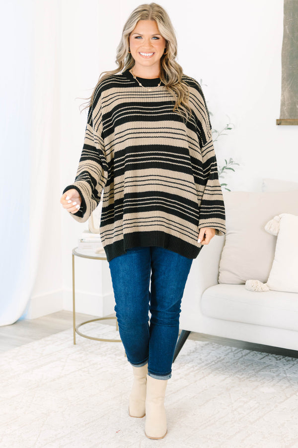 Plus Size oversized black and tan striped knit sweater with a crew neck and wide long sleeves.