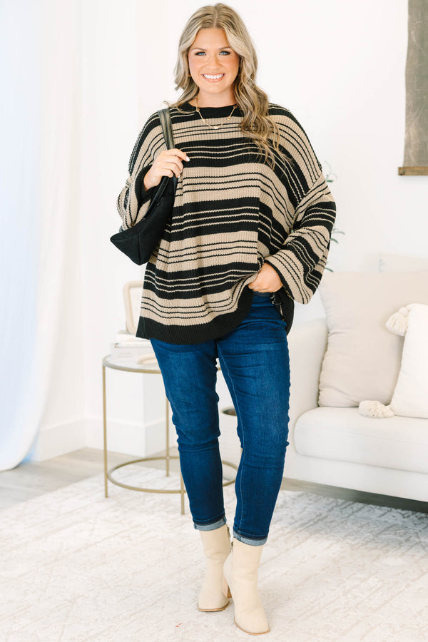 Plus Size oversized black and tan striped knit sweater with a crew neck and wide long sleeves.