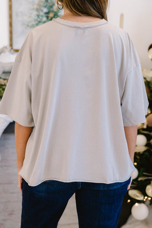 Chic Soul plus size clothing, stone tan short sleeve slightly cropped vintage wash tee with “North Pole Brewing Co. Christmas Spirits Premium Ext. 1824” text on the front with a reindeer mountains and tree