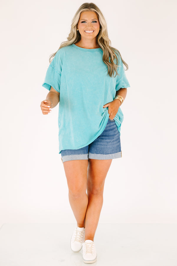 Plus size woman in a Relax and Repeat Turquoise Tee with an oversized, flowy fit and mineral wash.