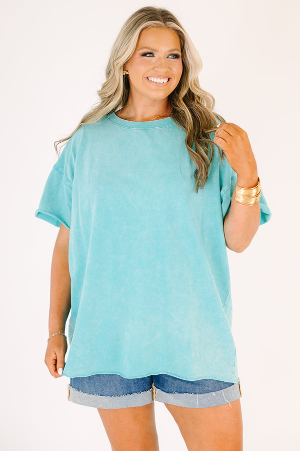 Plus size woman in a Relax and Repeat Turquoise Tee with an oversized, flowy fit and mineral wash.