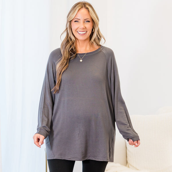 Plus Size charcoal grey fleece-lined dolman tunic with a relaxed fit, long sleeves, and round neck.
