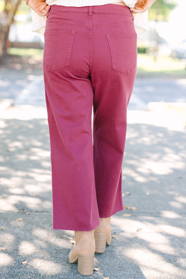 Plus size clothing high rise cropped burgundy denim with raw hemline