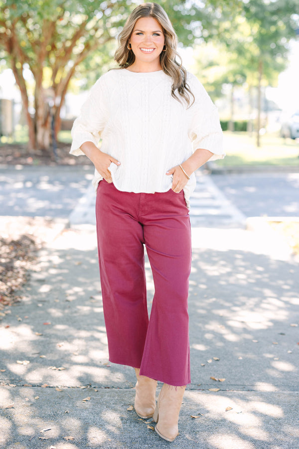 Plus size clothing high rise cropped burgundy denim with raw hemline