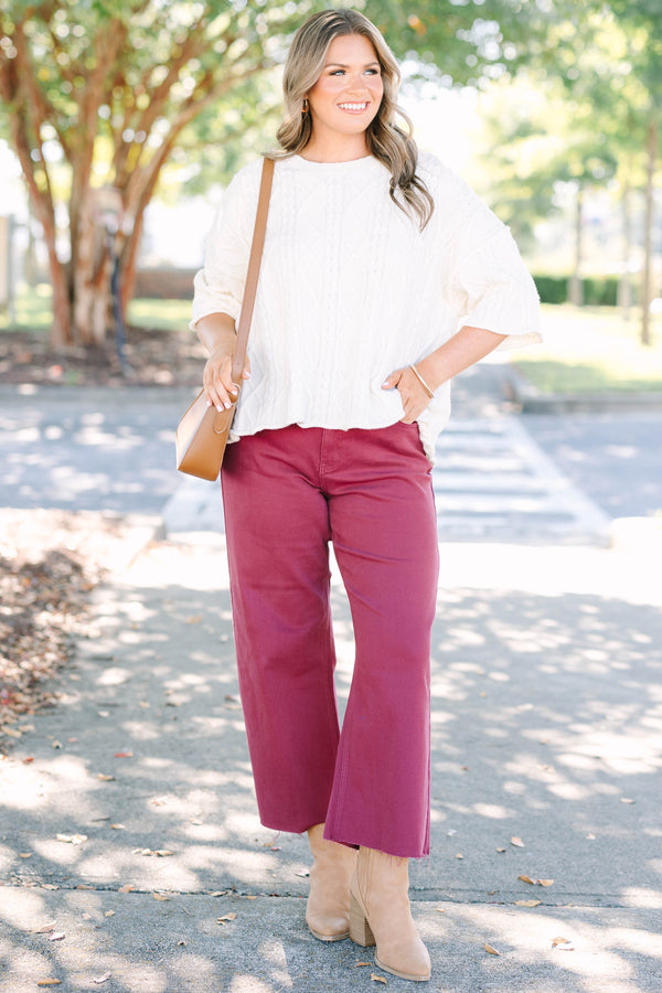 Plus size clothing high rise cropped burgundy denim with raw hemline