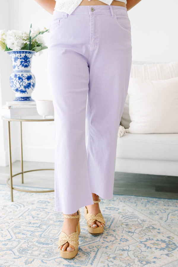 Plus Size lavender wide-leg jeans with a high-waist fit and raw-edge hems.