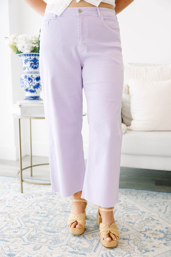 Plus Size lavender wide-leg jeans with a high-waist fit and raw-edge hems.