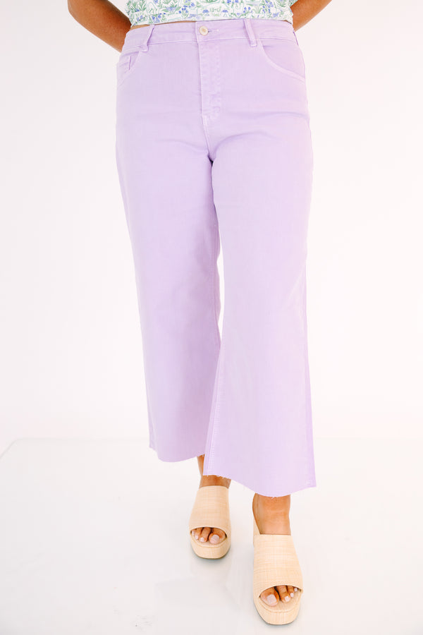 Plus Size lavender wide-leg jeans with a high-waist fit and raw-edge hems.
