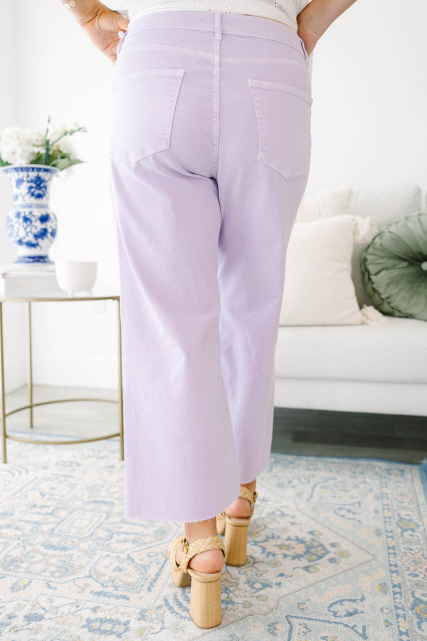 Plus Size lavender wide-leg jeans with a high-waist fit and raw-edge hems.