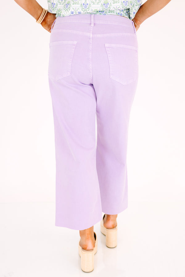 Plus Size lavender wide-leg jeans with a high-waist fit and raw-edge hems.