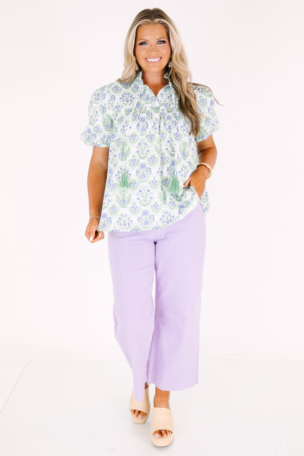 Plus Size lavender wide-leg jeans with a high-waist fit and raw-edge hems.