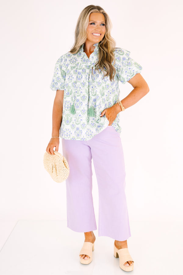 Plus Size lavender wide-leg jeans with a high-waist fit and raw-edge hems.