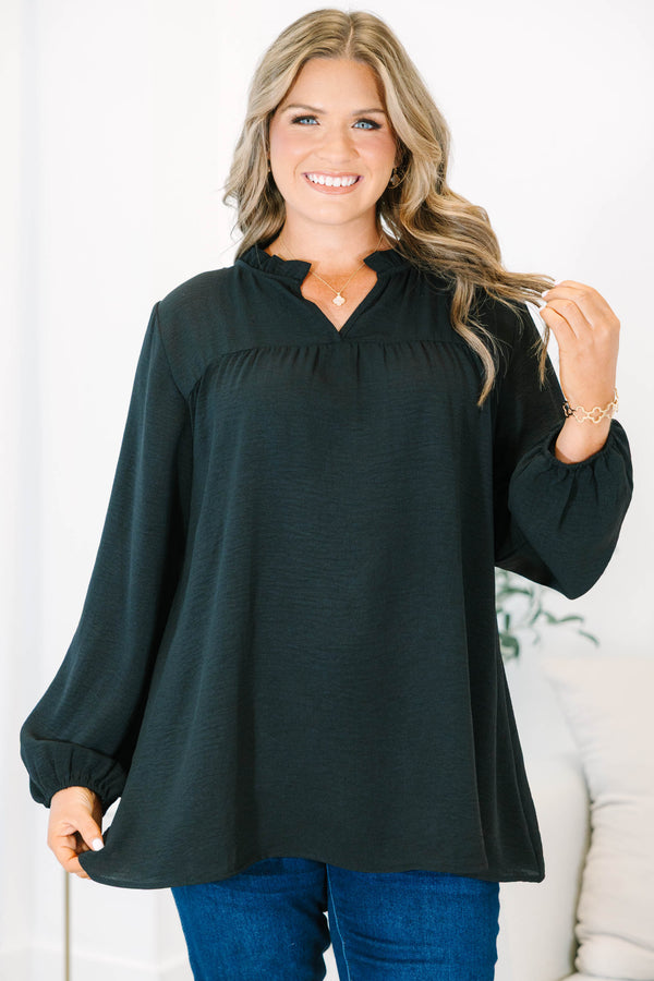 Plus Size black long sleeve top with a ruffled split neckline and a relaxed, flowy fit.