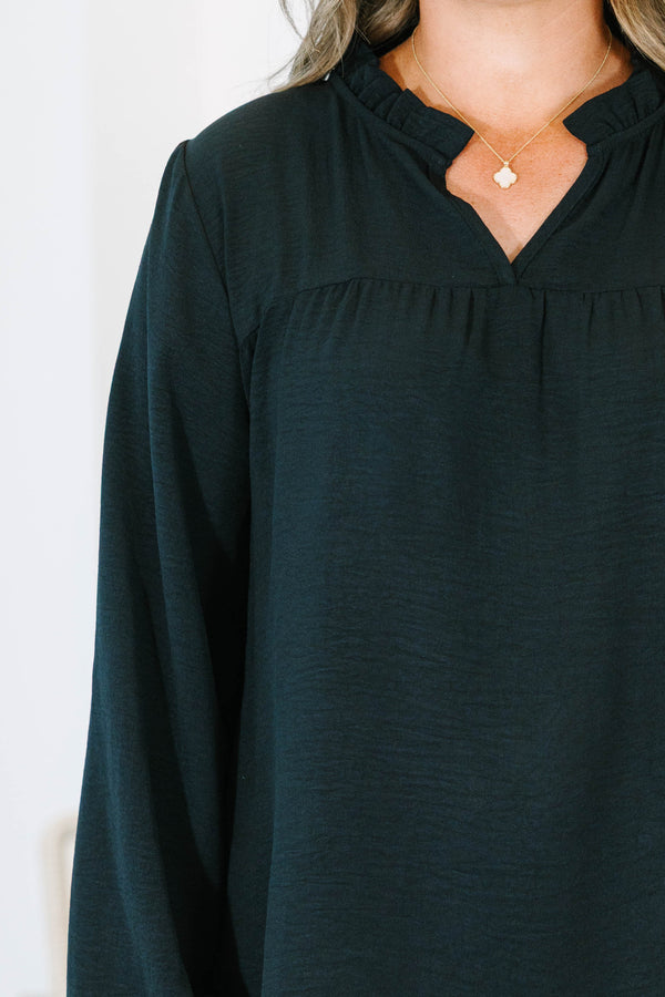 Plus Size black long sleeve top with a ruffled split neckline and a relaxed, flowy fit.