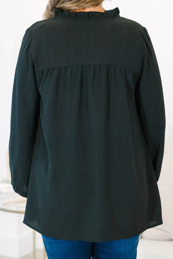 Plus Size black long sleeve top with a ruffled split neckline and a relaxed, flowy fit.