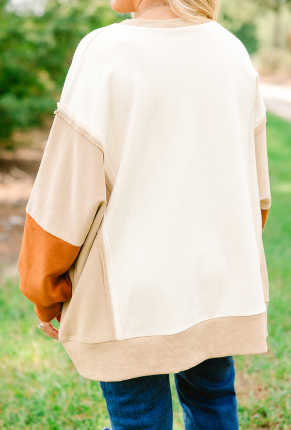 Chic Soul plus size clothing, cream long sleeve crewneck pullover with tan and burnt orange color blocked sleeves