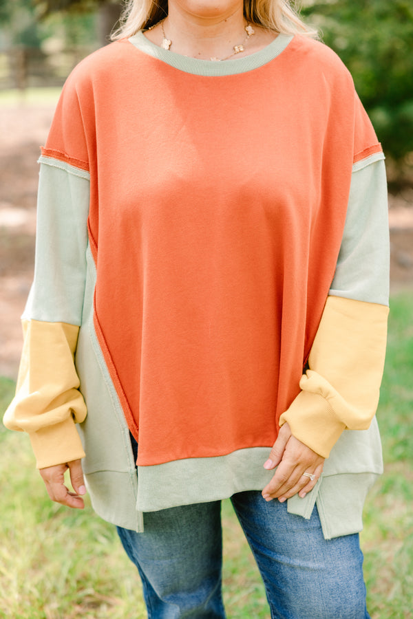 Chic Soul plus size clothing, oversized orange crew neck pullover with green and yellow color blocked sleeves 
