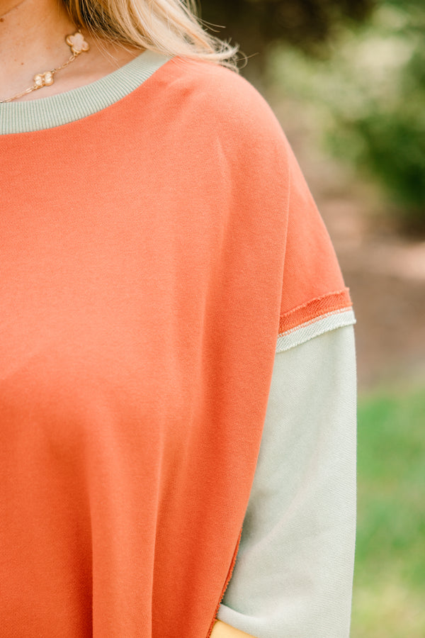 Chic Soul plus size clothing, oversized orange crew neck pullover with green and yellow color blocked sleeves 
