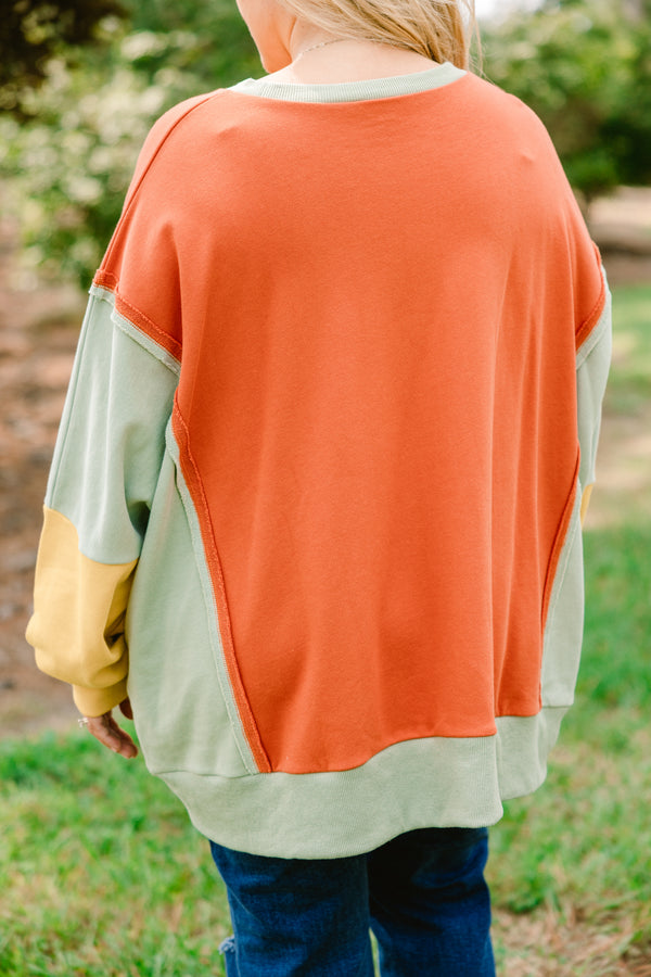 Chic Soul plus size clothing, oversized orange crew neck pullover with green and yellow color blocked sleeves 
