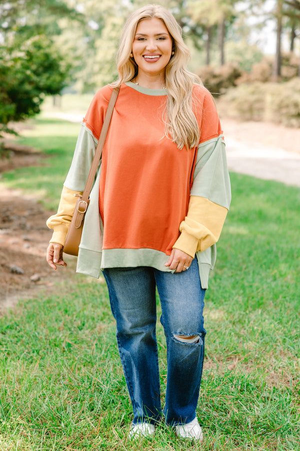 Chic Soul plus size clothing, oversized orange crew neck pullover with green and yellow color blocked sleeves 
