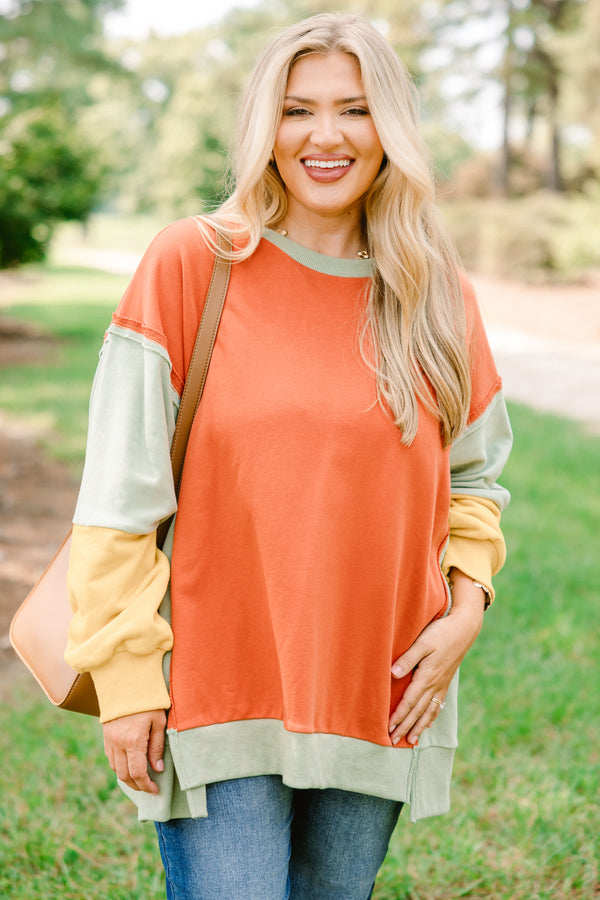 Chic Soul plus size clothing, oversized orange crew neck pullover with green and yellow color blocked sleeves 

