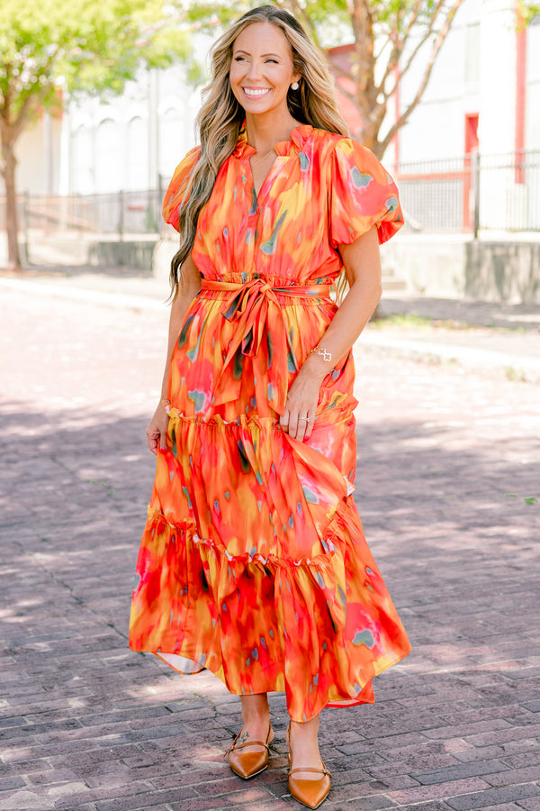 Chic Soul plus size clothing, orange short sleeve tiered maxi dress with an abstract pattern and a bow that ties around the waist 