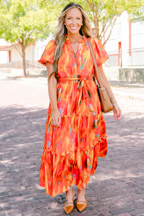 Chic Soul plus size clothing, orange short sleeve tiered maxi dress with an abstract pattern and a bow that ties around the waist 