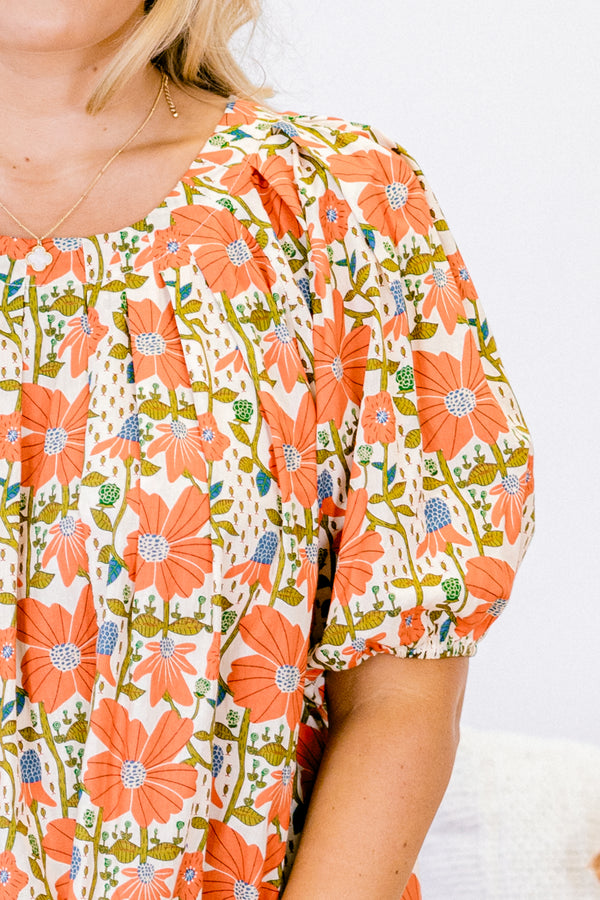 Chic Soul plus size clothing, ivory puff short sleeve top with red, orange, and green floral pattern