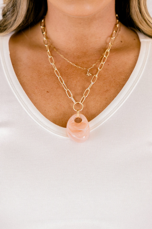Chic Soul plus size clothing, gold and pink necklace that has a  pink marble stone attached to to gold chain 