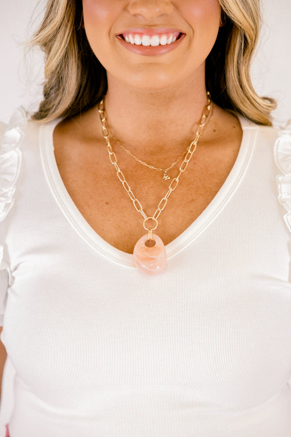 Chic Soul plus size clothing, gold and pink necklace that has a  pink marble stone attached to to gold chain 