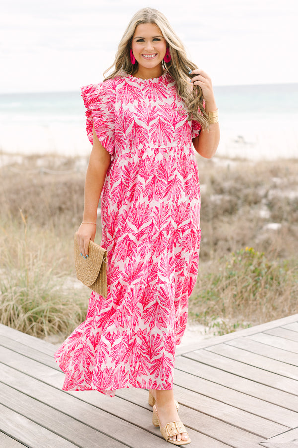 Chic Soul plus size clothing, fuchsia maxi dress with a high neck and flutter sleeves as well as a palm leaf pattern throughout 