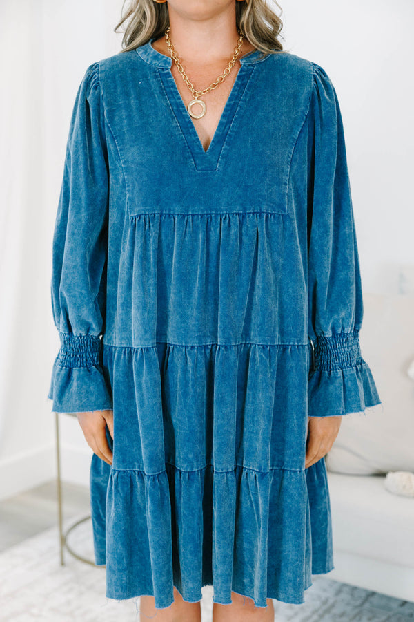 Plus Size blue corduroy tiered dress with a V-neckline and ruffled elbow-length sleeves.