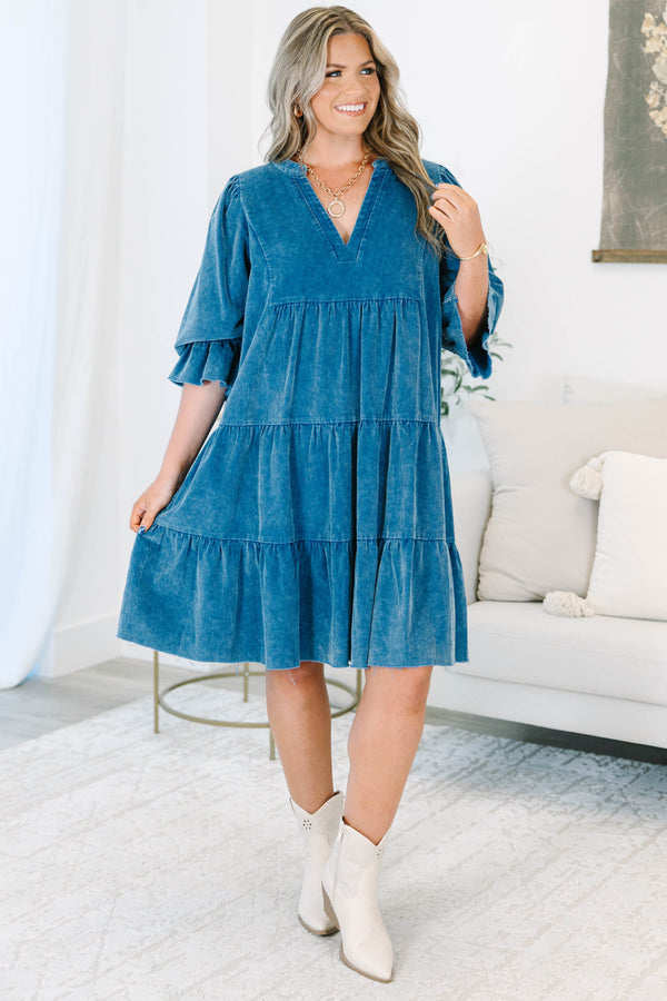 Plus Size blue corduroy tiered dress with a V-neckline and ruffled elbow-length sleeves.