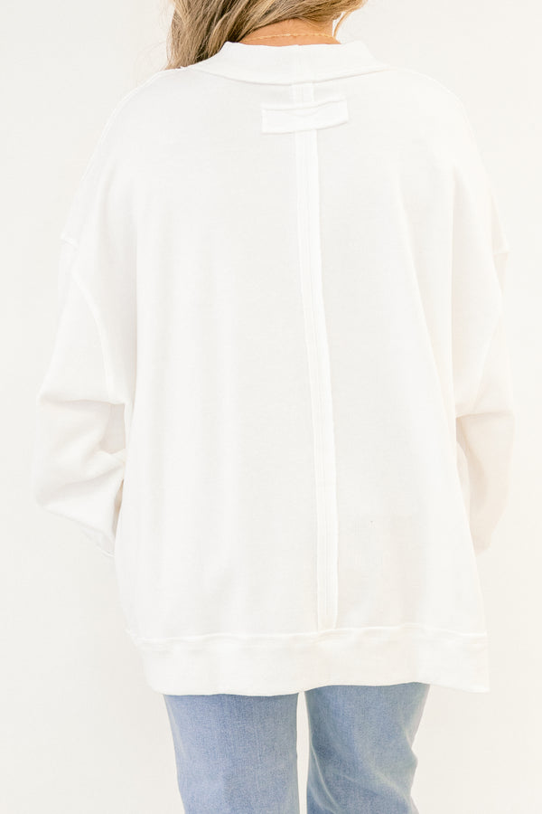 Chic Soul plus size clothing, ivory white mock neck long sleeve pullover with light pink outline of a heart on the front of the pullover