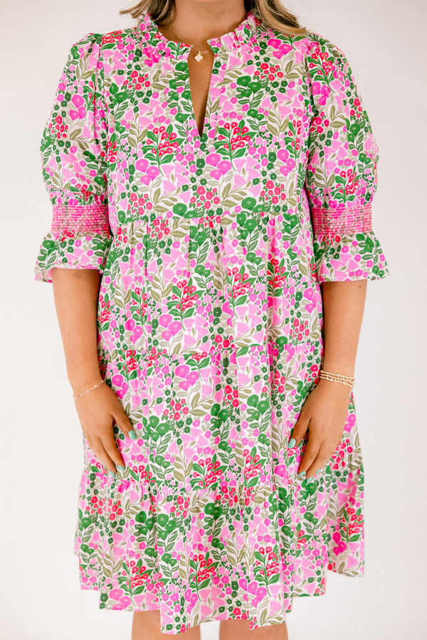 Chic Soul plus size clothing, pink multi color knee length dress with half sleeves that have a ruffle detail on the bottom of each sleeve and pink stitching details above the ruffle as well as a floral pattern 