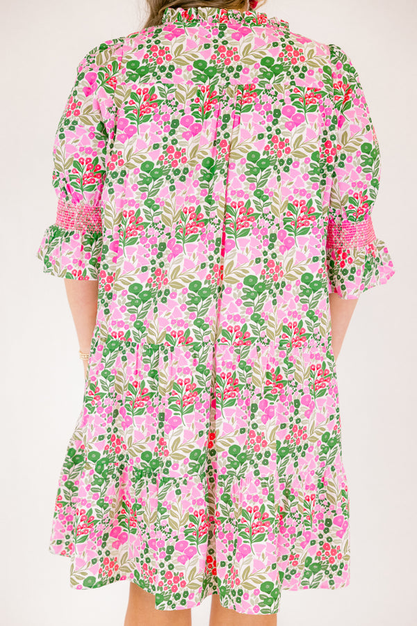 Chic Soul plus size clothing, pink multi color knee length dress with half sleeves that have a ruffle detail on the bottom of each sleeve and pink stitching details above the ruffle as well as a floral pattern 