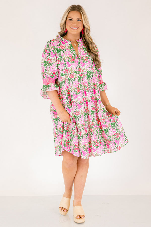 Chic Soul plus size clothing, pink multi color knee length dress with half sleeves that have a ruffle detail on the bottom of each sleeve and pink stitching details above the ruffle as well as a floral pattern 