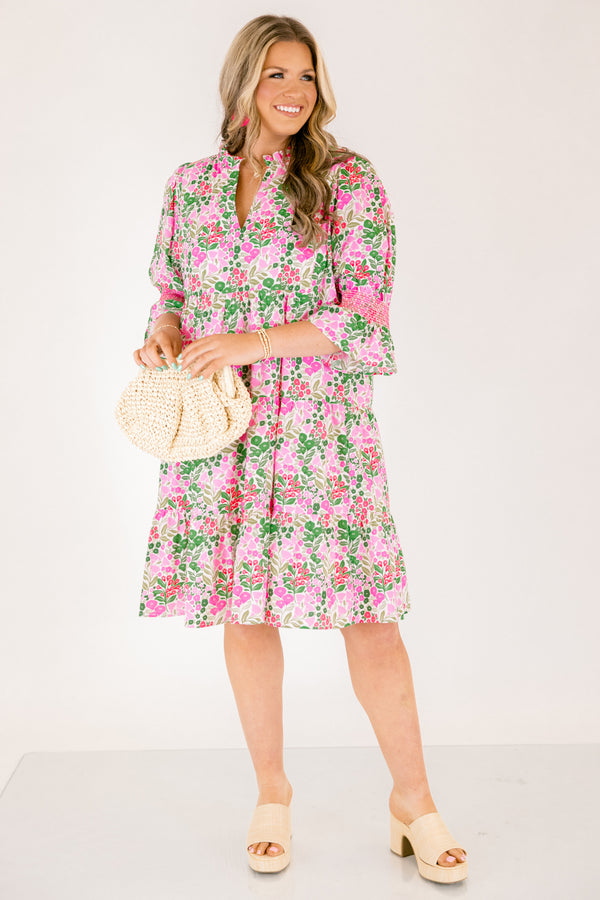 Chic Soul plus size clothing, pink multi color knee length dress with half sleeves that have a ruffle detail on the bottom of each sleeve and pink stitching details above the ruffle as well as a floral pattern 