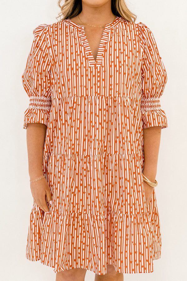 Chic Soul plus size clothing, red and orange abstract pattern mid sleeve short tiered dress with v-neckline and cinching at the ends of the sleeves