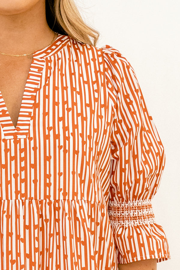 Chic Soul plus size clothing, red and orange abstract pattern mid sleeve short tiered dress with v-neckline and cinching at the ends of the sleeves