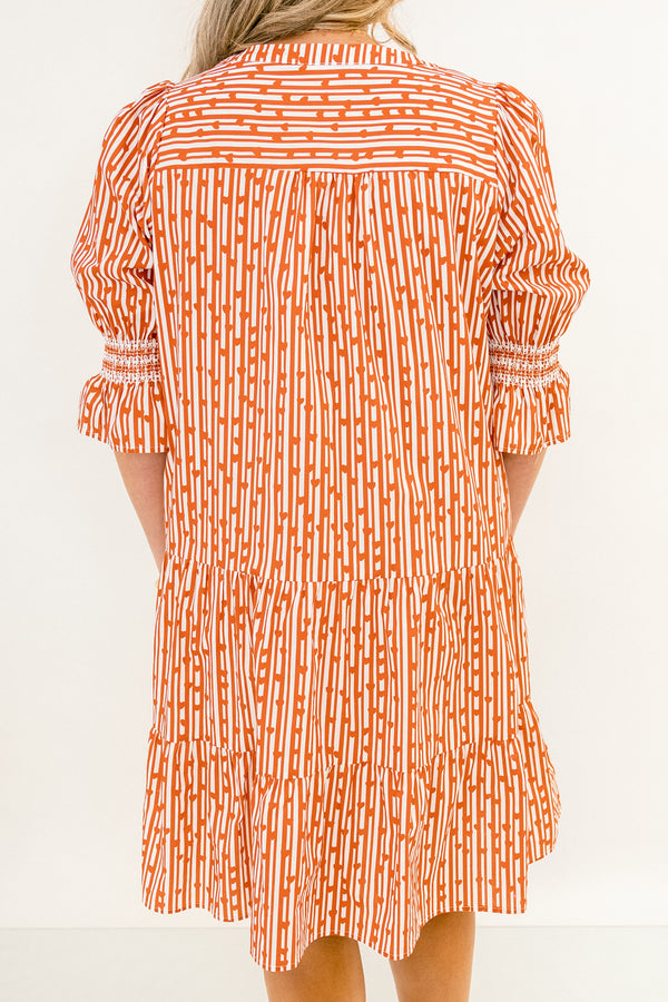 Chic Soul plus size clothing, red and orange abstract pattern mid sleeve short tiered dress with v-neckline and cinching at the ends of the sleeves