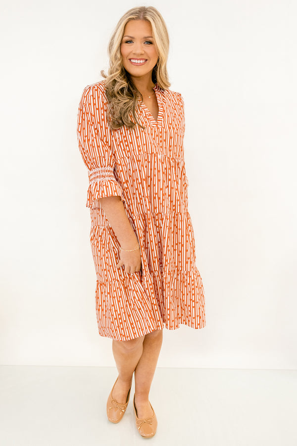 Chic Soul plus size clothing, red and orange abstract pattern mid sleeve short tiered dress with v-neckline and cinching at the ends of the sleeves