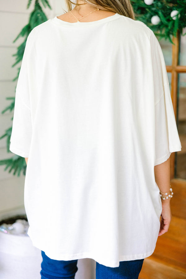 Chic Soul plus size clothing, ivory oversized boyfriend tee with large red Santa print bow in the middle