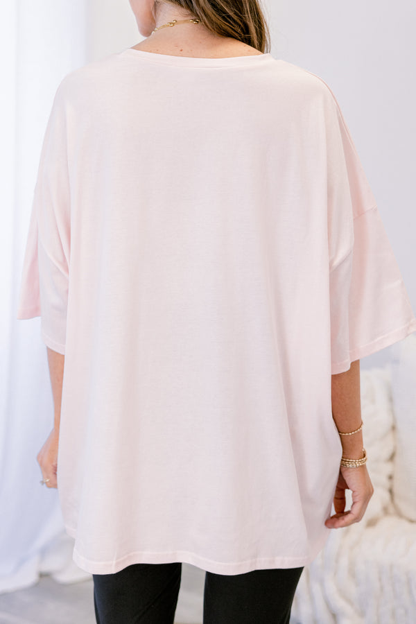 Chic Soul plus size clothing, cream short sleeve graphic tee with a Santa graphic on the center of the shirt that is surrounded  by a wavy bordered that has red polka dot bows on the edges